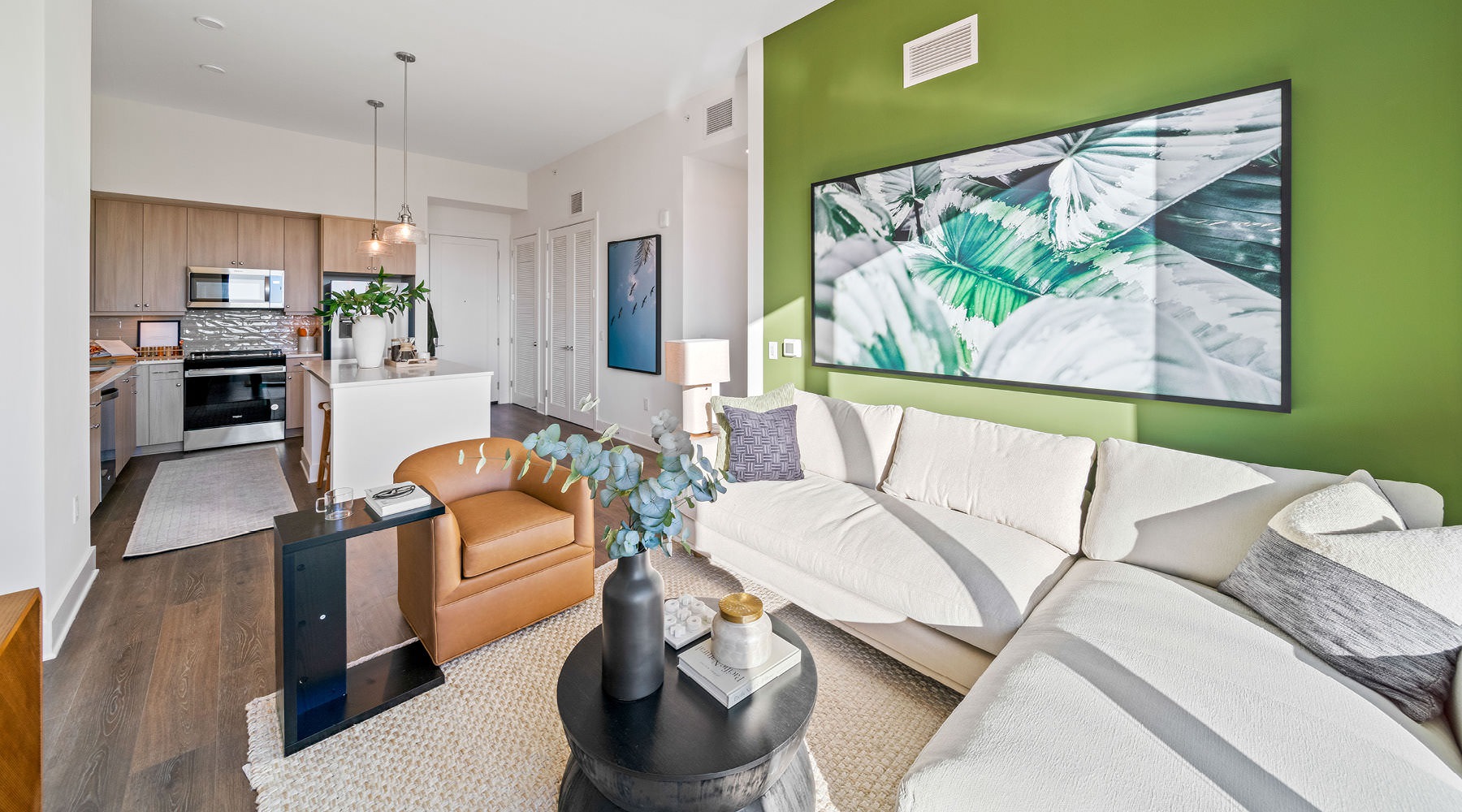 a living room with a green wall