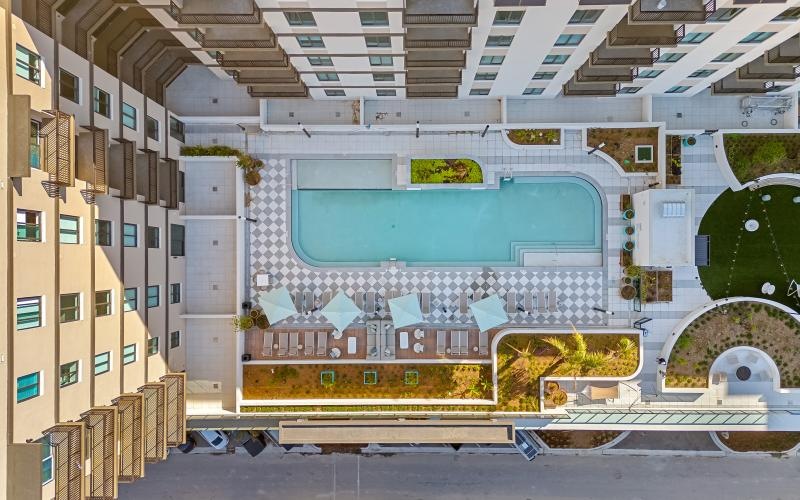 a courtyard with a pool